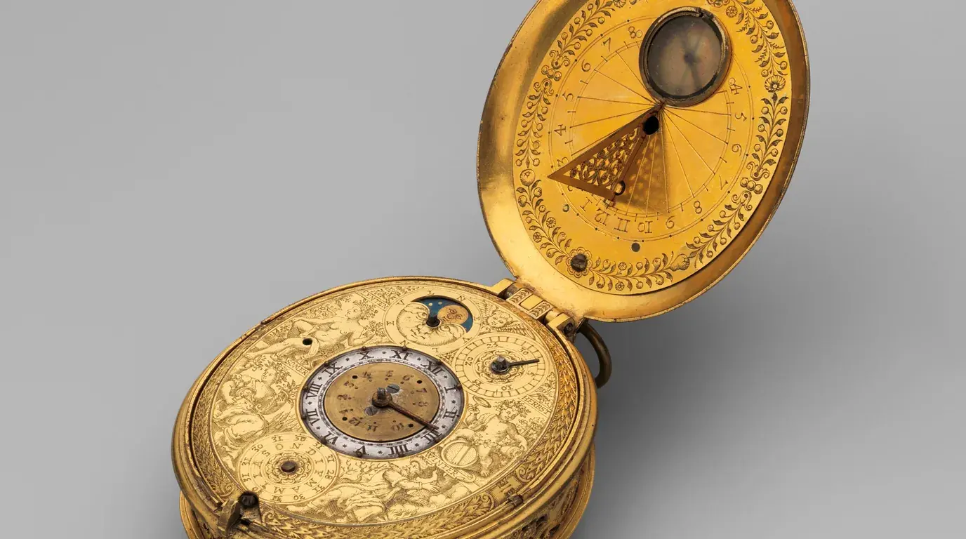 A gilt clock watch with an astronomical dial and a sundial in its open lid, by Jan Jansen Bockeltz, c. 1605–10.